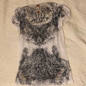 Lace back embellishment top.